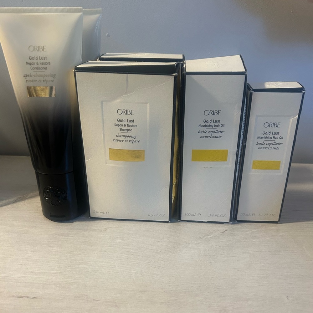 Brand new in boxes Oribe Gold Lust sets